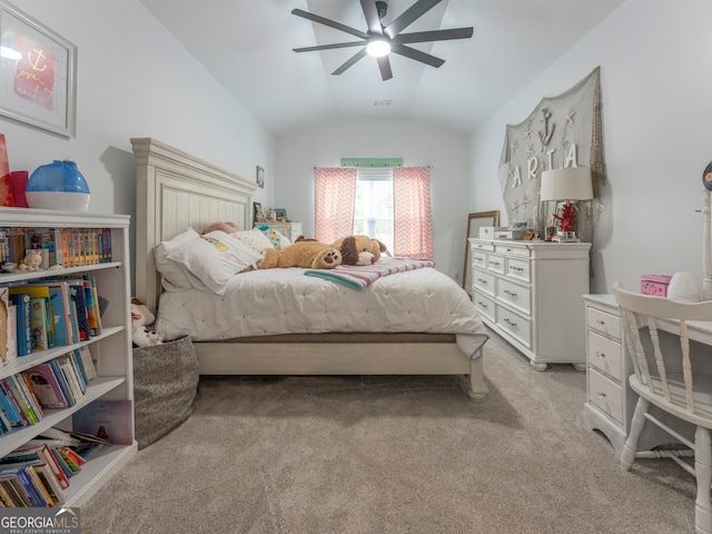 carpeted bedroom featuring ceiling fan and vaulted ceiling