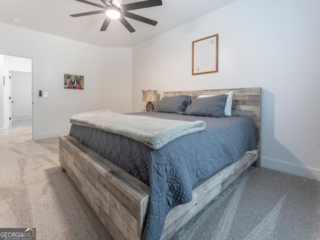 bedroom featuring ceiling fan and carpet floors