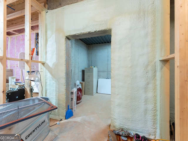 interior space featuring concrete flooring