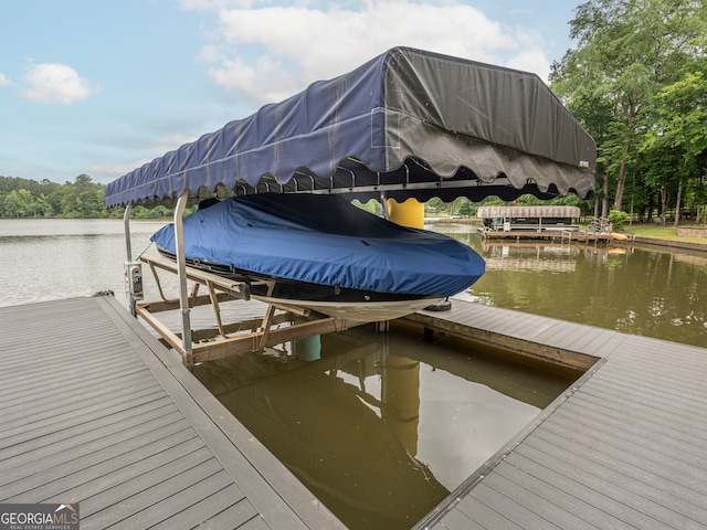 view of dock with a water view