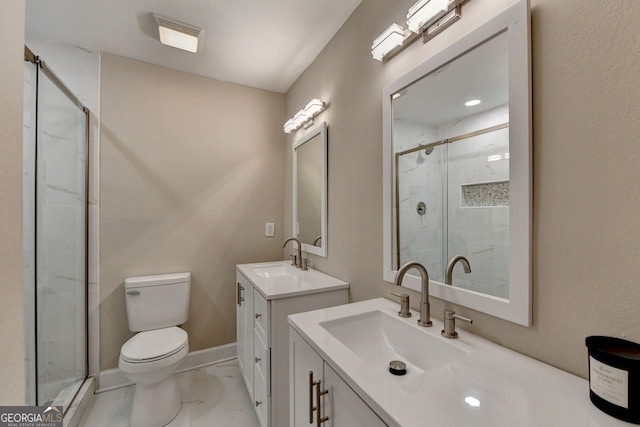 bathroom featuring an enclosed shower, vanity, and toilet