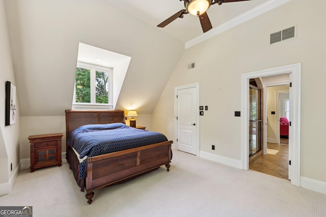 carpeted bedroom with lofted ceiling, ceiling fan, and ornamental molding