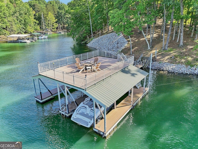 dock area with a deck with water view