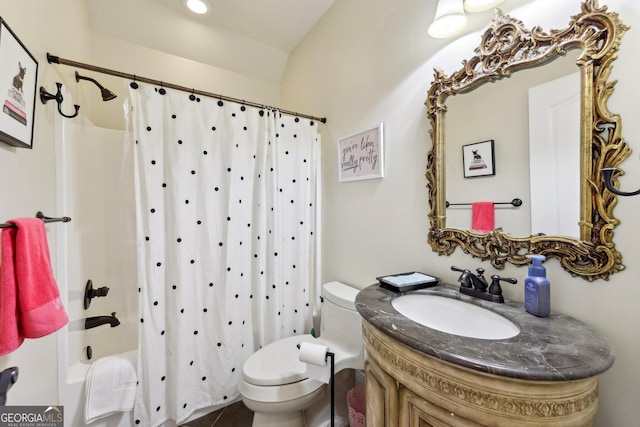 bathroom with vanity, toilet, and walk in shower