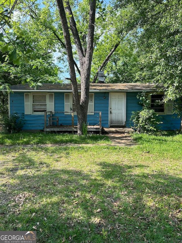 exterior space with a lawn