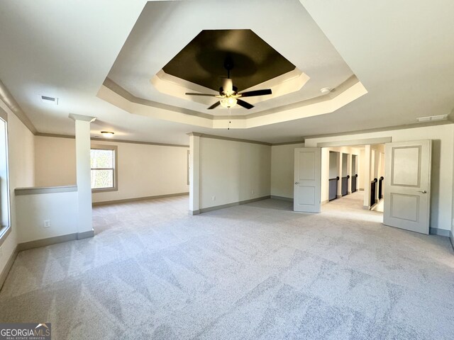 interior space with ceiling fan and light carpet