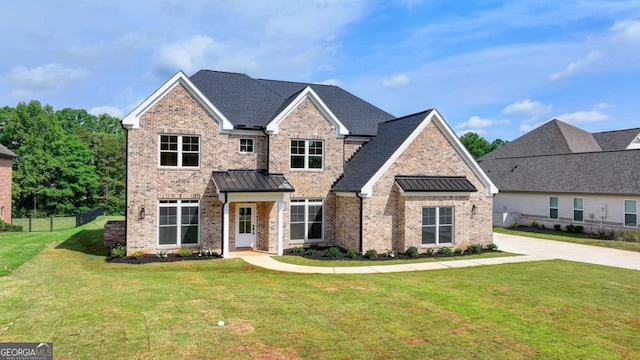 view of front facade with a front yard