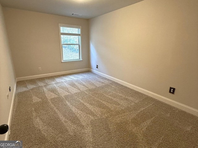 unfurnished room with carpet