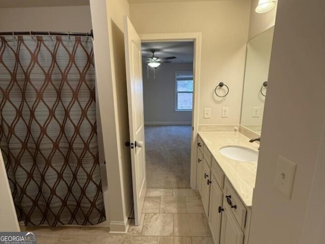 bathroom with vanity and ceiling fan