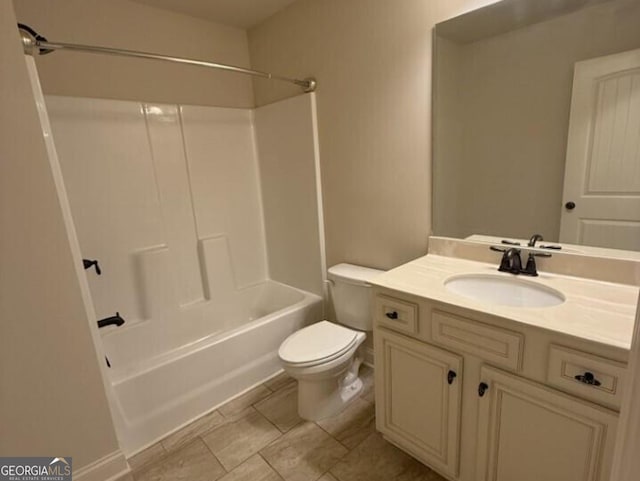 full bathroom featuring  shower combination, vanity, and toilet