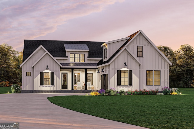 modern farmhouse featuring a yard