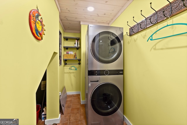 washroom featuring stacked washer / dryer, wooden ceiling, and tile flooring