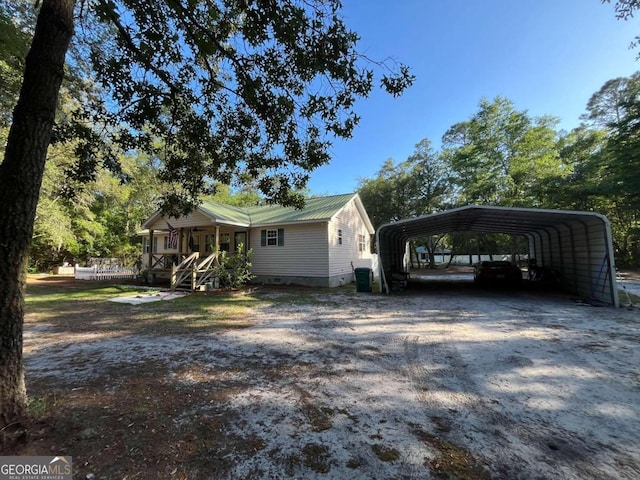 exterior space with a carport