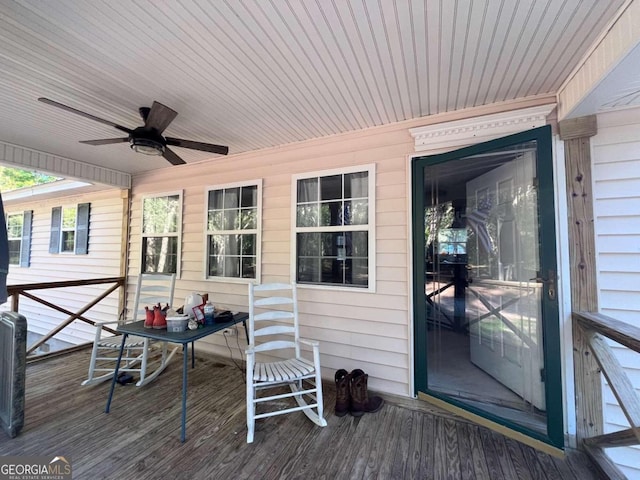 wooden deck with ceiling fan