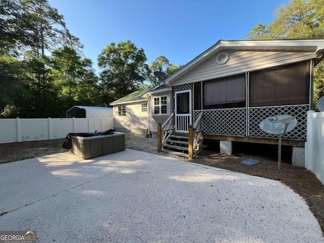 rear view of house featuring a patio area