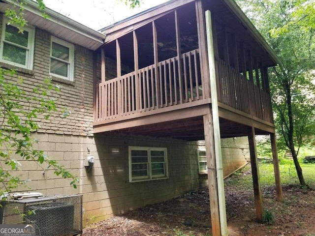 view of side of home featuring central air condition unit