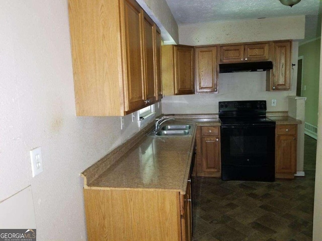 kitchen with sink, black range with electric stovetop, and dark tile floors