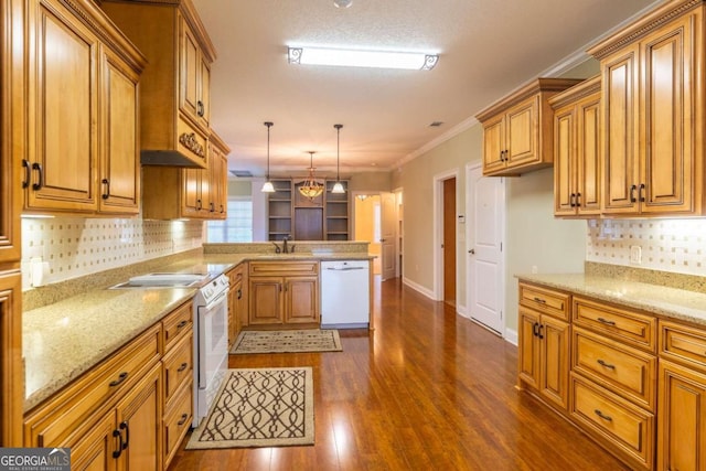 kitchen with dark hardwood / wood-style floors, tasteful backsplash, white appliances, hanging light fixtures, and ornamental molding