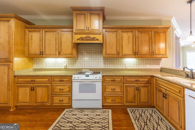 kitchen featuring decorative light fixtures, white appliances, sink, and dark hardwood / wood-style flooring