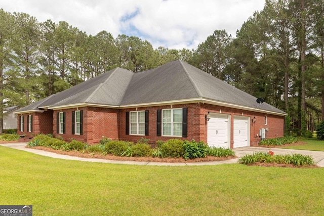 view of front of house featuring a garage and a front lawn