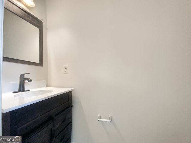 bathroom featuring large vanity