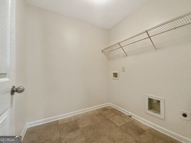 clothes washing area featuring tile flooring, washer hookup, hookup for an electric dryer, and hookup for a gas dryer