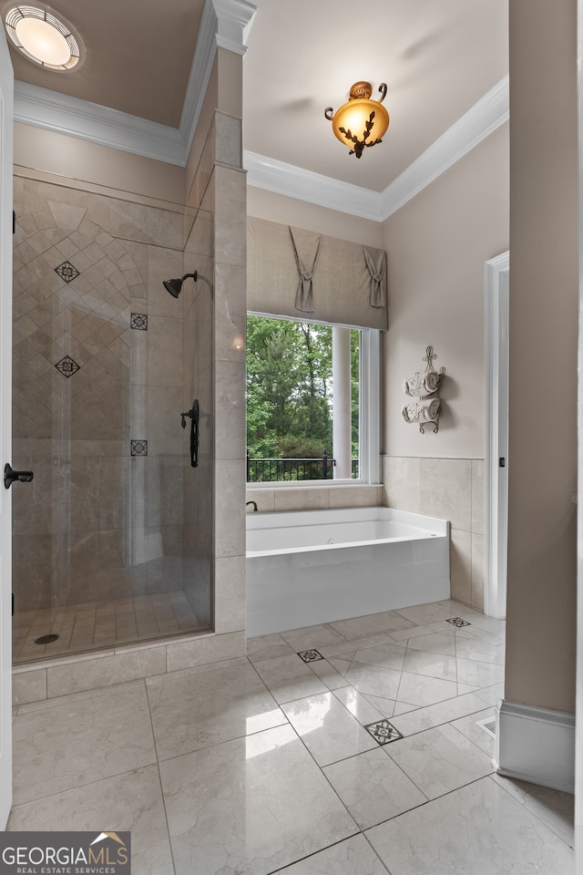 bathroom with tile flooring, ornamental molding, and plus walk in shower