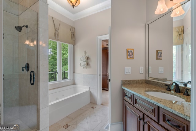 bathroom with ornamental molding, independent shower and bath, tile flooring, and oversized vanity