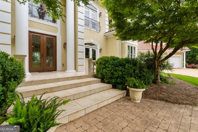 entrance to property featuring french doors