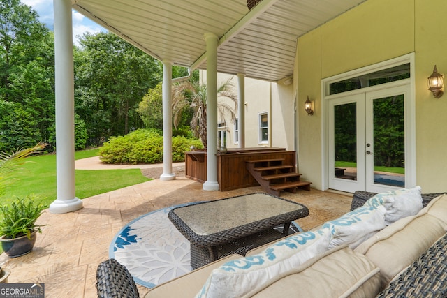 view of terrace featuring outdoor lounge area and french doors