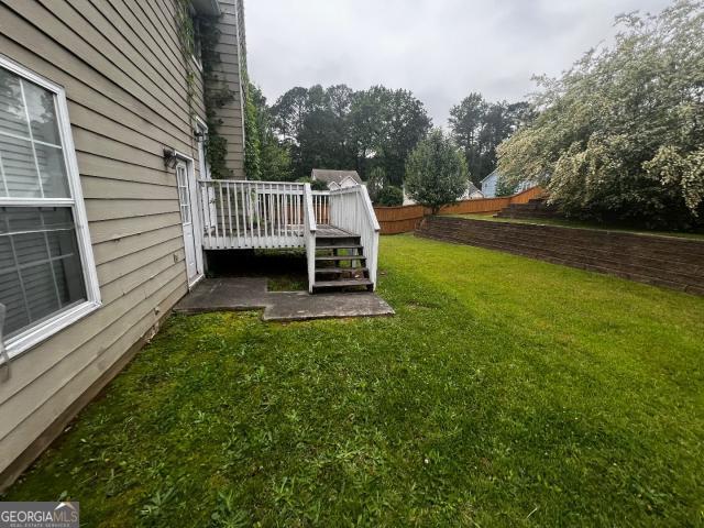 view of yard featuring a deck