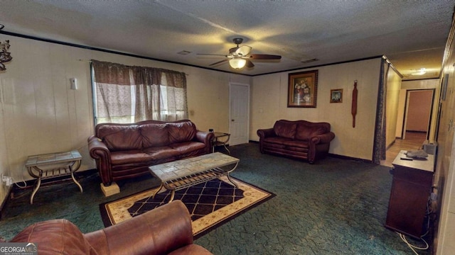 carpeted living room featuring ceiling fan and a textured ceiling