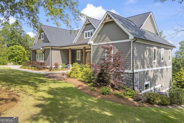 view of front of home with a front yard