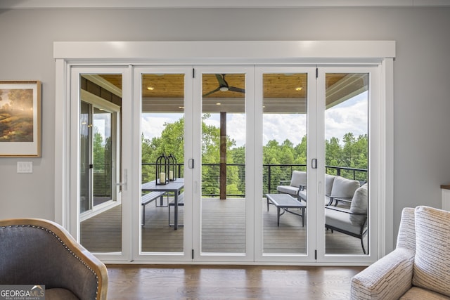 entryway with plenty of natural light and hardwood / wood-style floors