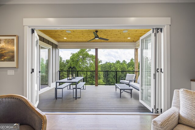 interior space featuring wood-type flooring and a wealth of natural light