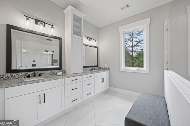 bathroom with tile patterned flooring, double sink vanity, and ornamental molding