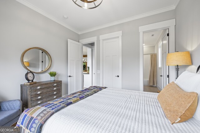 bedroom featuring crown molding