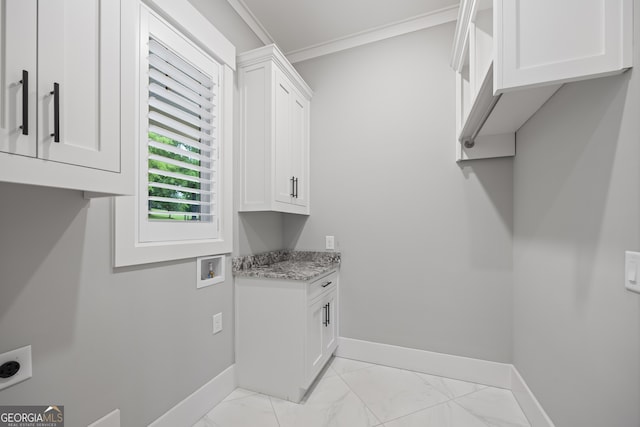 washroom featuring crown molding, light tile patterned floors, washer hookup, cabinets, and electric dryer hookup