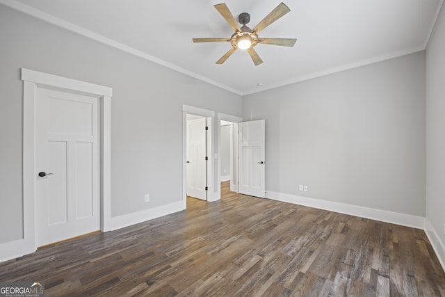 unfurnished bedroom with wood-type flooring, crown molding, and ceiling fan