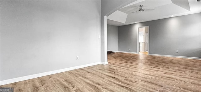 spare room featuring ceiling fan and hardwood / wood-style flooring