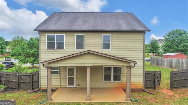 rear view of house with a patio