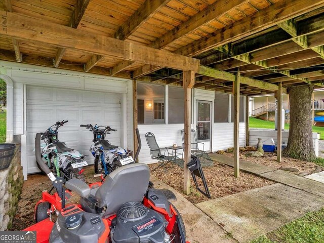 view of patio / terrace with a garage