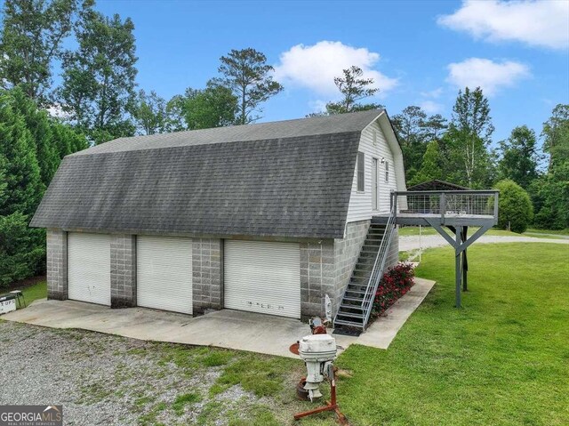 garage with a lawn