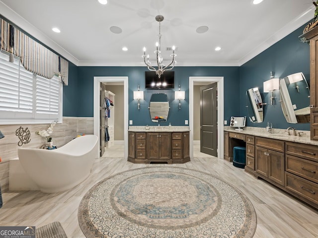 bathroom with crown molding, vanity, a notable chandelier, and tile floors