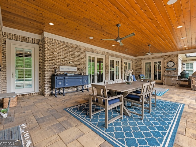 view of patio featuring ceiling fan and french doors