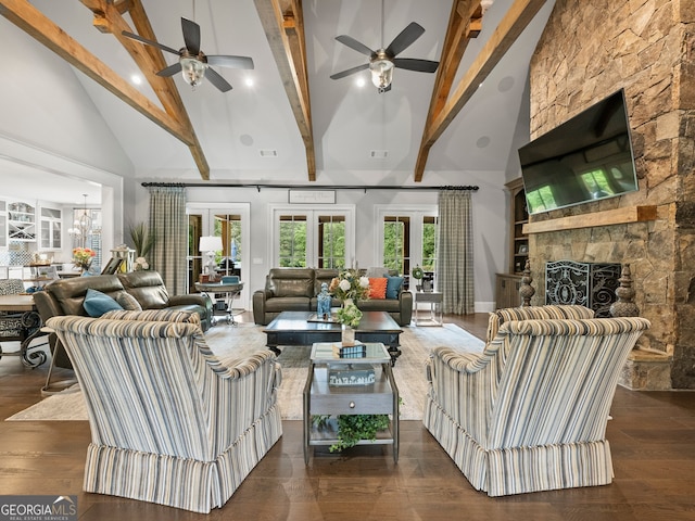 living room featuring beam ceiling, ceiling fan, and dark hardwood / wood-style flooring