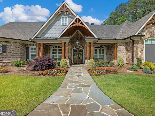 view of front of home with a front lawn