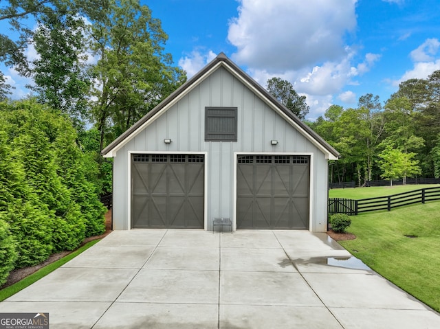 garage featuring a yard