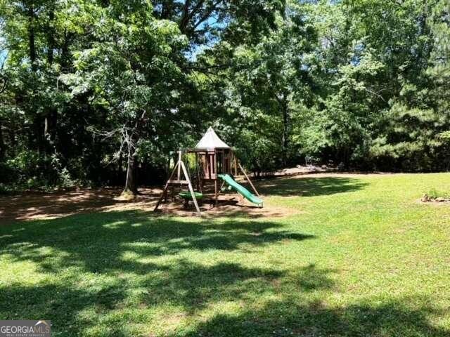 view of yard featuring a playground