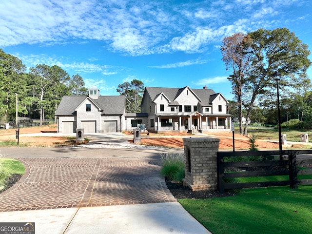 view of front facade with a garage and a front yard